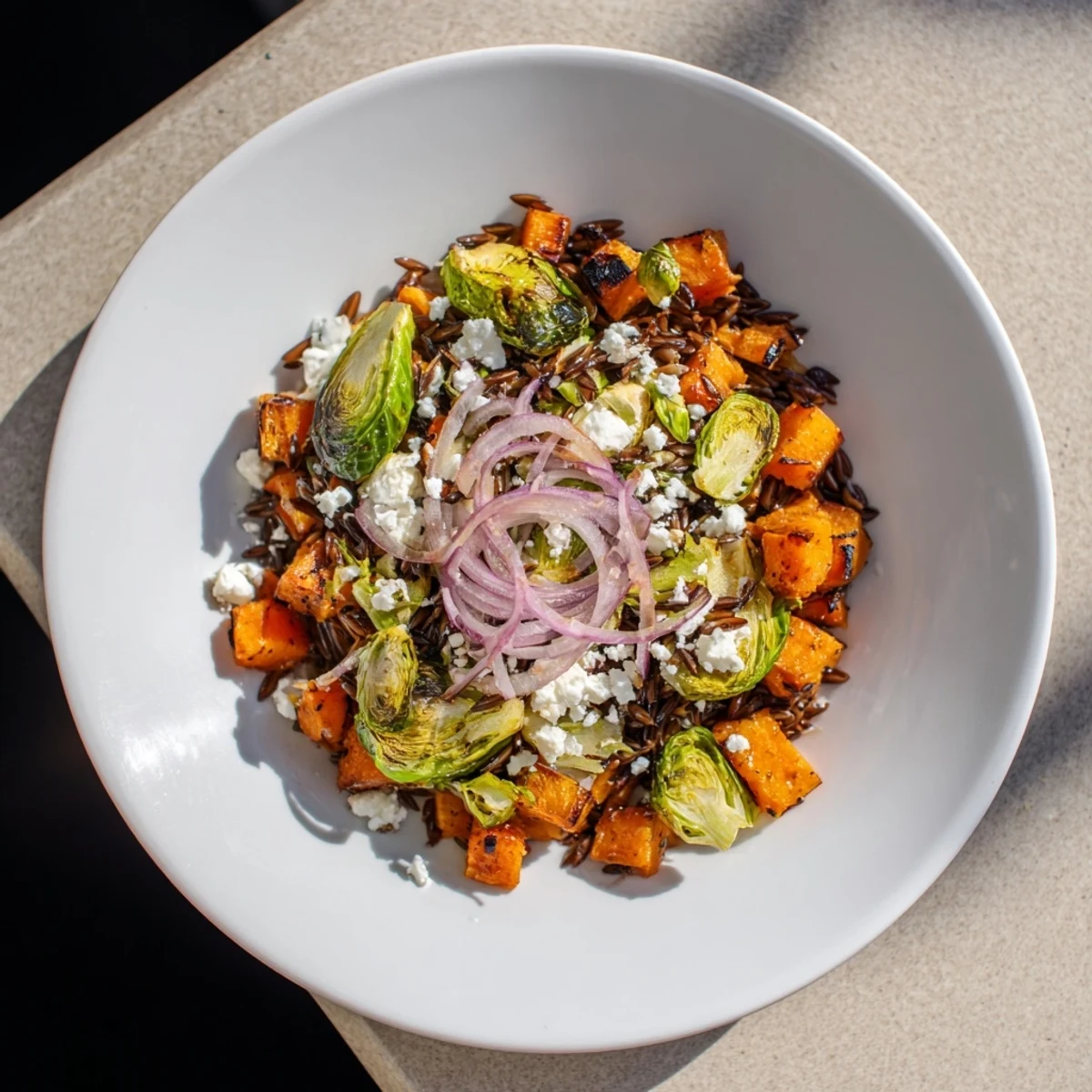 This Best Fall Harvest Orzo Salad features golden roasted butternut squash with a sweet and tangy dressing.