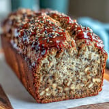 Fragrant black sesame banana bread, golden brown and baked to perfection.