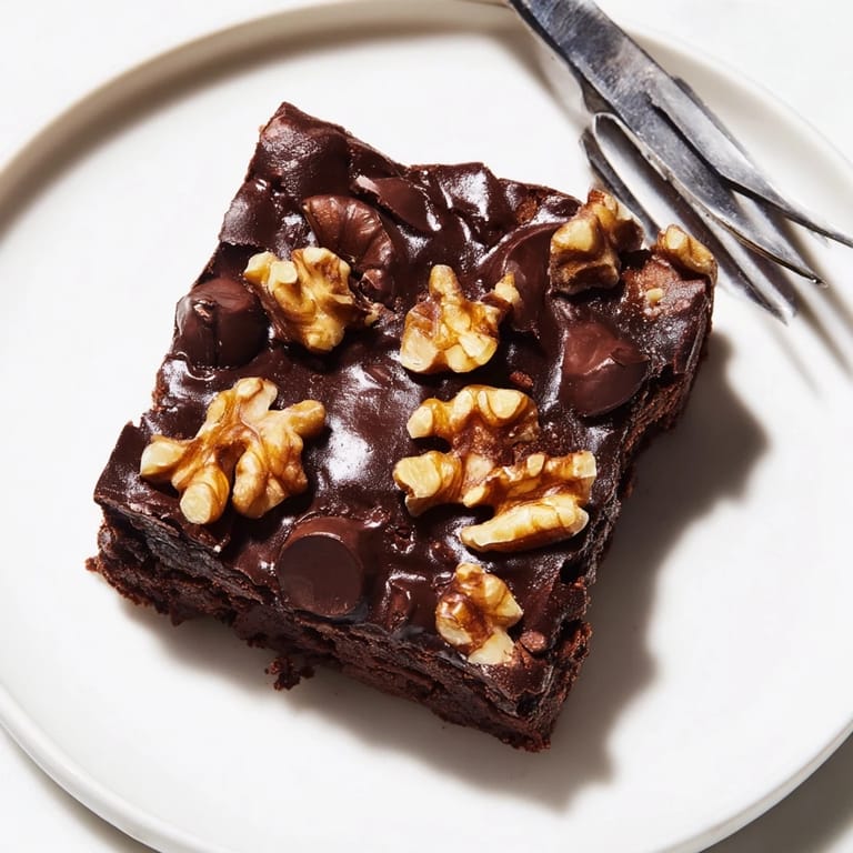 Decadent fudgy brownies showcasing leftover nut-milk pulp for eco-friendly indulgence.  