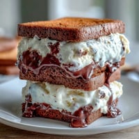 Vanilla Bean Frappuccino Ice Cream Sandwiches with creamy vanilla ice cream between rich espresso cookies